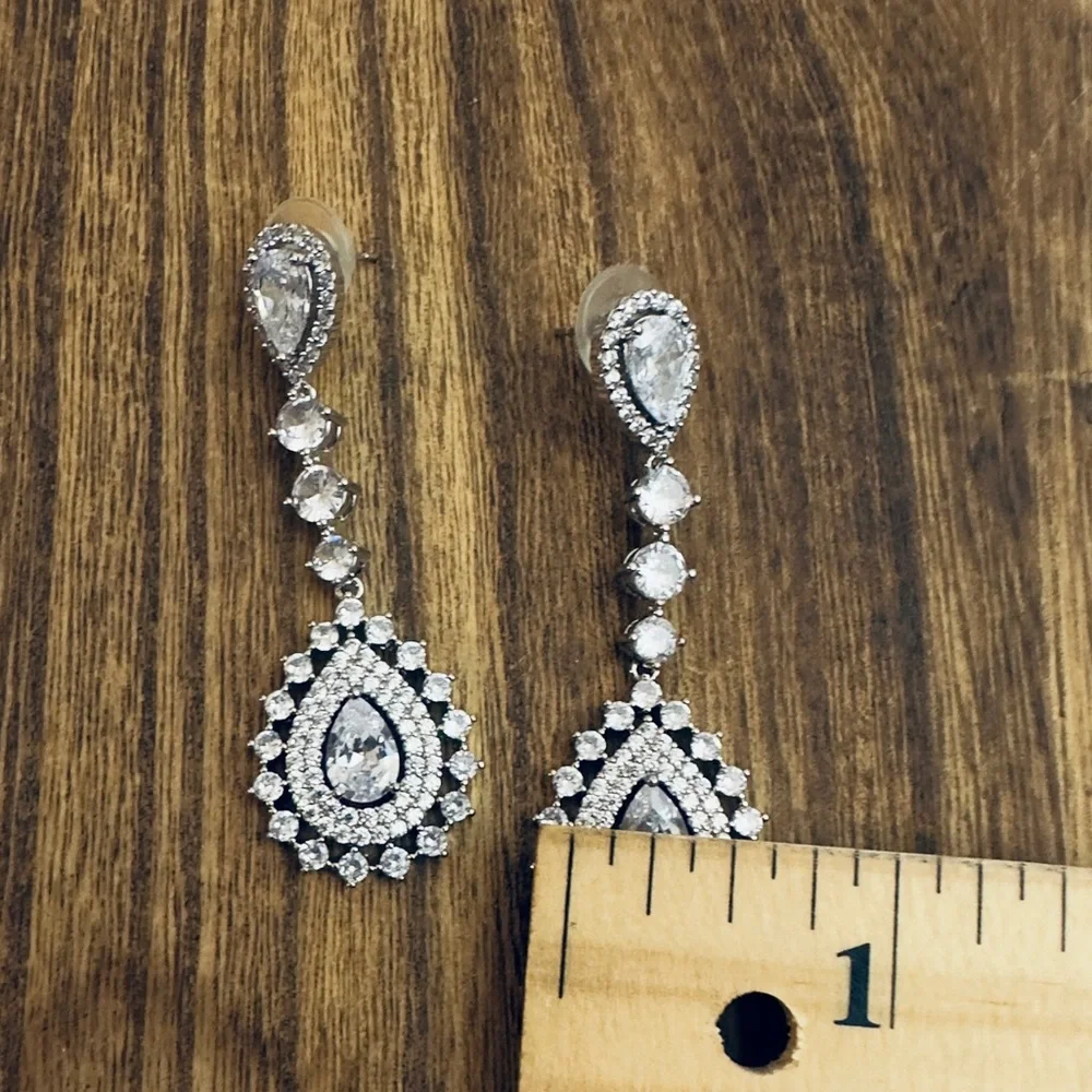 Elegant Silver color‎ Teardrop Earrings New never worn. Prom wedding